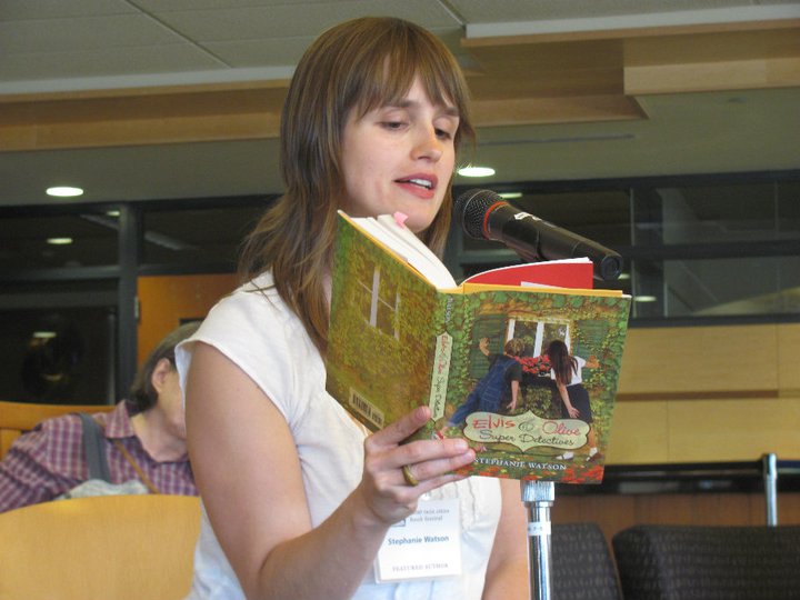 Author Stephanie Watson reading from one of her books.